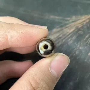 Step 12: Bilateral Drilling — Everest amulet craftsmanship process